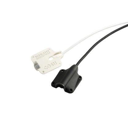 White and black lav mic concealment housing with attached cable and connector