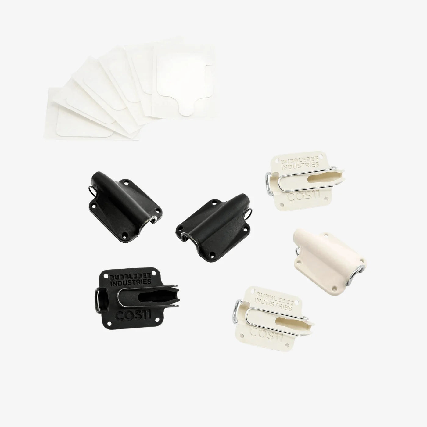 Lav mic concealment housings set in black and white with mounting plates