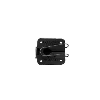 Black lav mic concealer clip mechanism with Shure compatibility labels