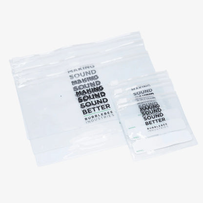 Clear lav mic pouch set with printed labels, containing coiled cable.