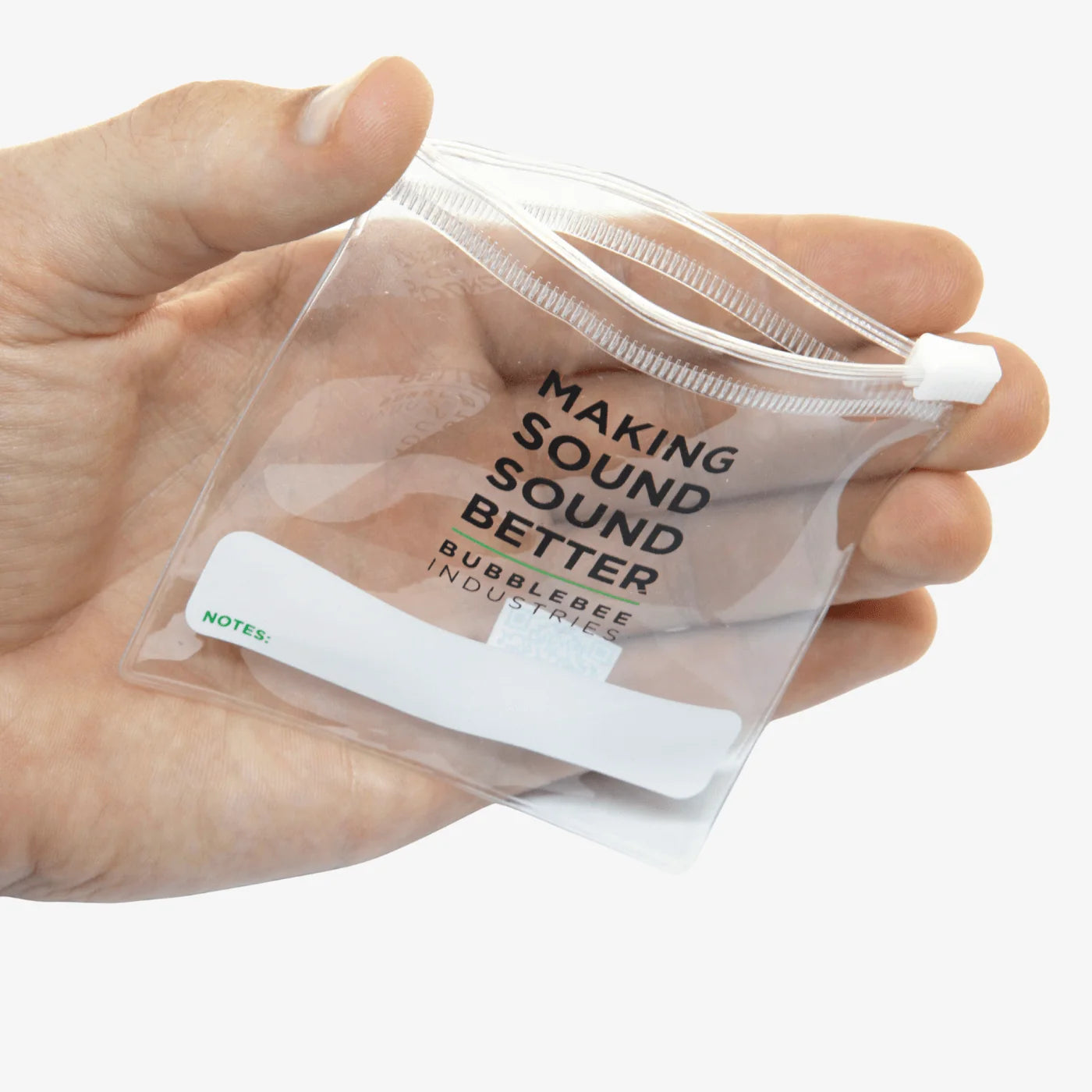 Clear lav mic pouch with zip top and coiled cable, held in hand.