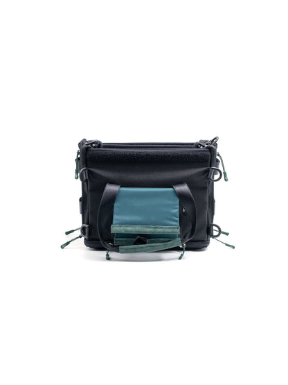 Small audio mixer bag with front flap and teal document holder inside pocket
