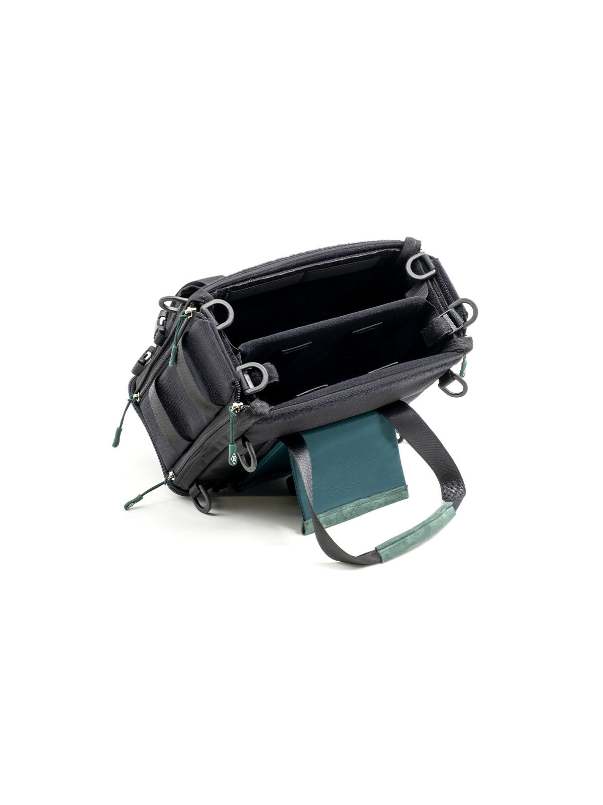 Small audio mixer bag side view with teal organizer panel and front zipper pocket