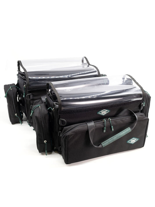 Black medium audio mixer recorder bag with clear top cover, front pouch, and teal details