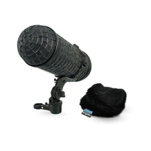 Shotgun microphone with black textured grille and black foam windscreen on mount