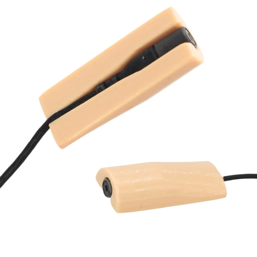 Beige microphone mount with black cable and cylindrical foam base