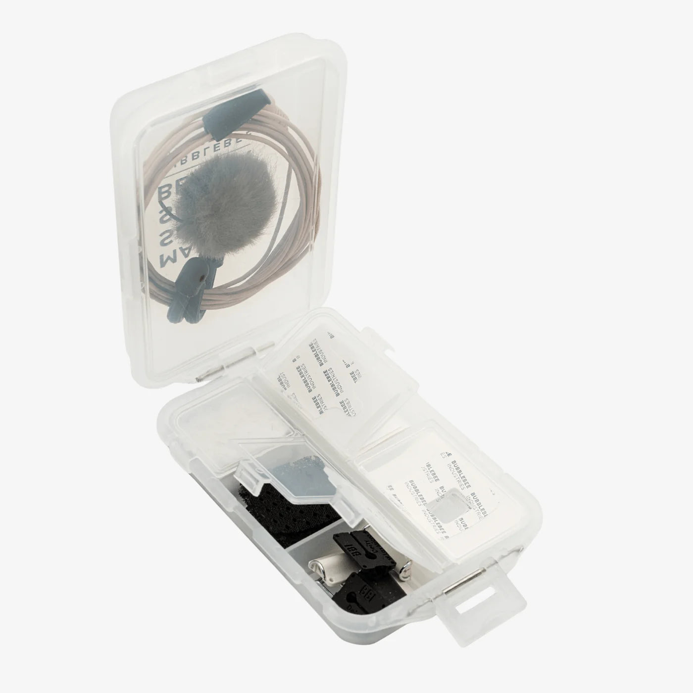 Translucent accessory case open with foam windscreen and cable set inside