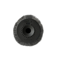 Grey round windshield brush pad with central hole and dotted grip pattern