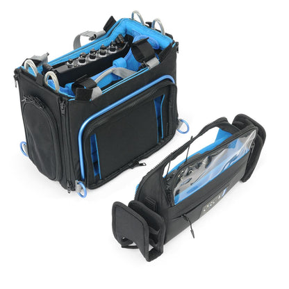 Audio mixer bag open view with blue compartments, black exterior and dual handles.