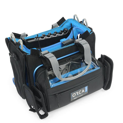 Black audio mixer bag with clear front window, blue lining, and front ORCA label.