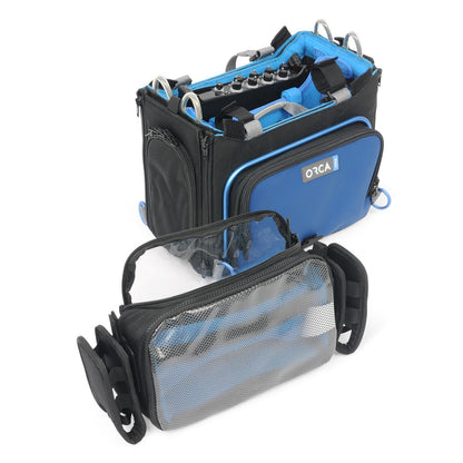 Black and blue audio mixer bag with open top and lower front storage pouch.