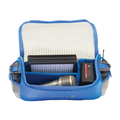 Accessories pouch shown loaded with canister and compact electronics in blue compartments