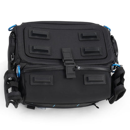 Audio mixer bag with multiple molded pockets; black exterior with blue accents and carry straps