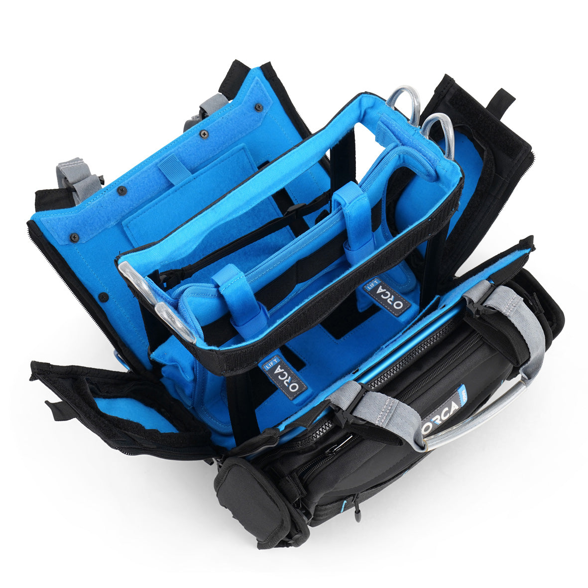 Audio mixer bag with open side access; blue interior organizers and metal rails for equipment