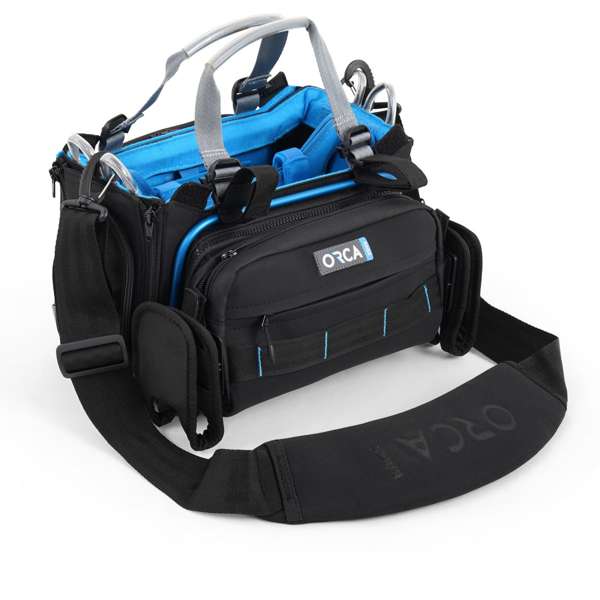 Audio mixer bag with blue lining, black shoulder strap, side pockets and ORCA front logo