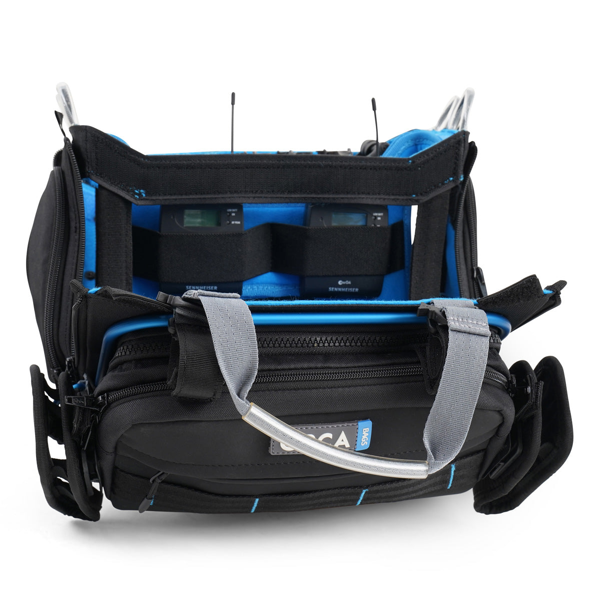 Audio mixer bag open to show blue interior panels and foam dividers inside the main compartment