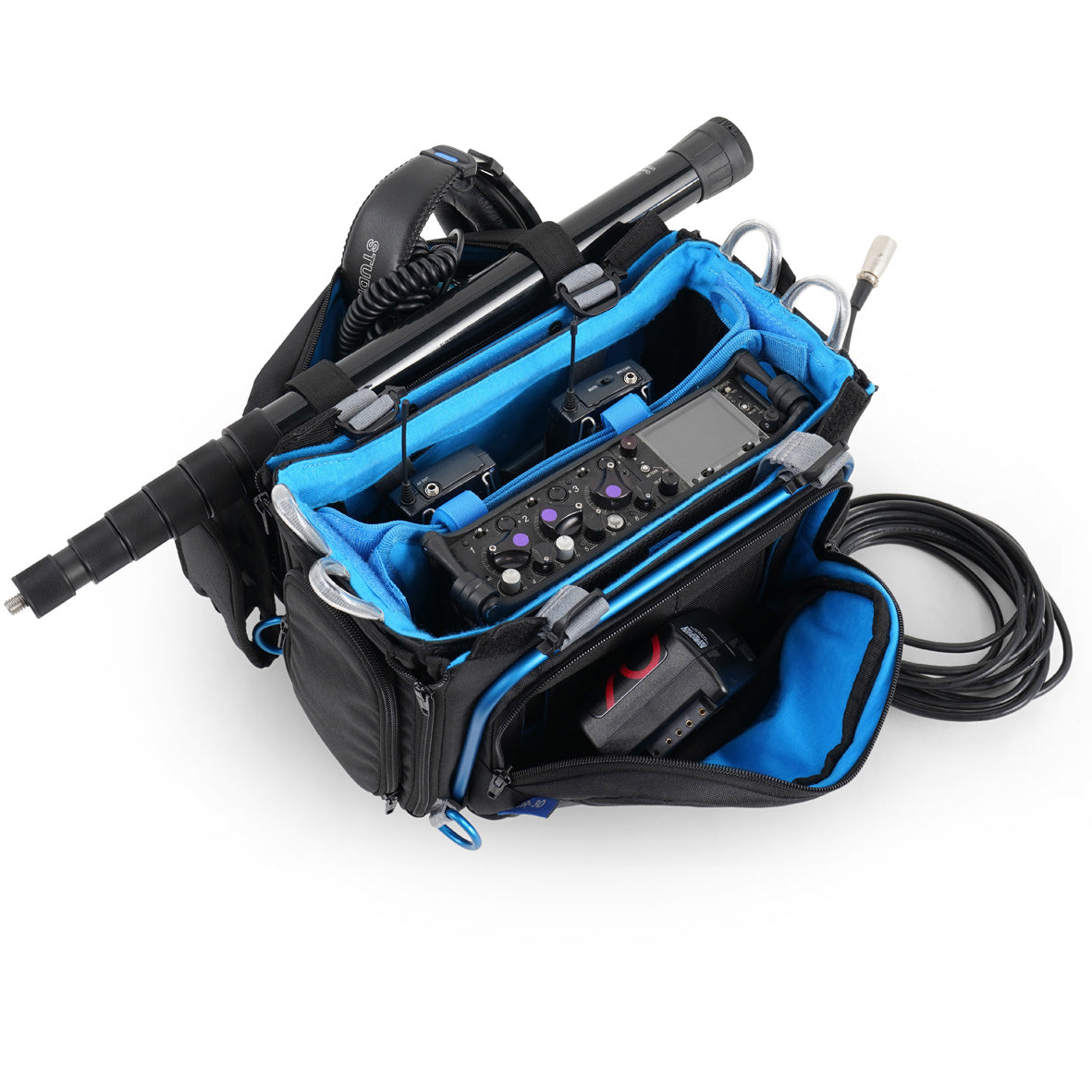 Audio mixer bag loaded with audio gear; black exterior with bright blue interior and cables