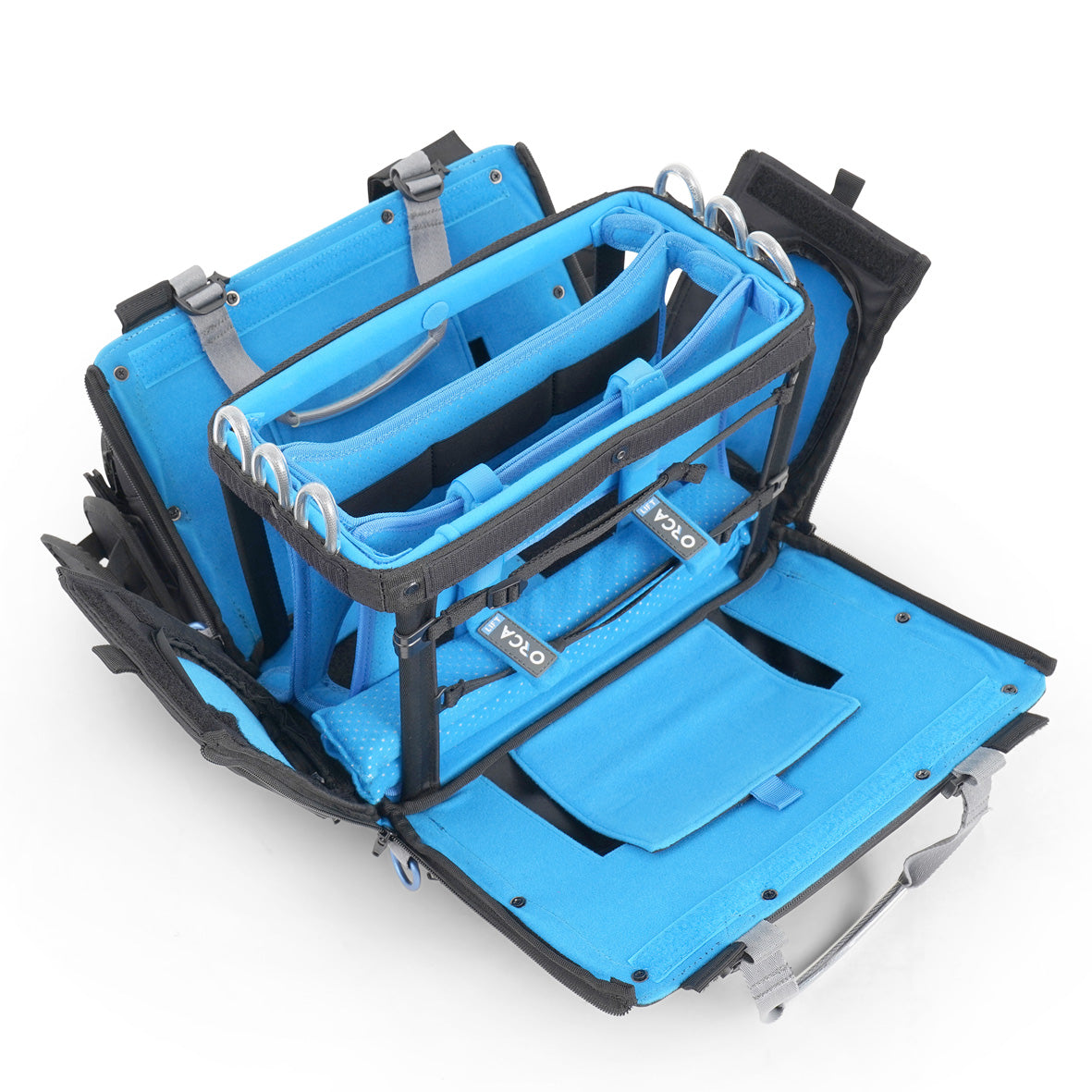 Audio mixer bag open with blue base tray, straps, and black side storage pockets.