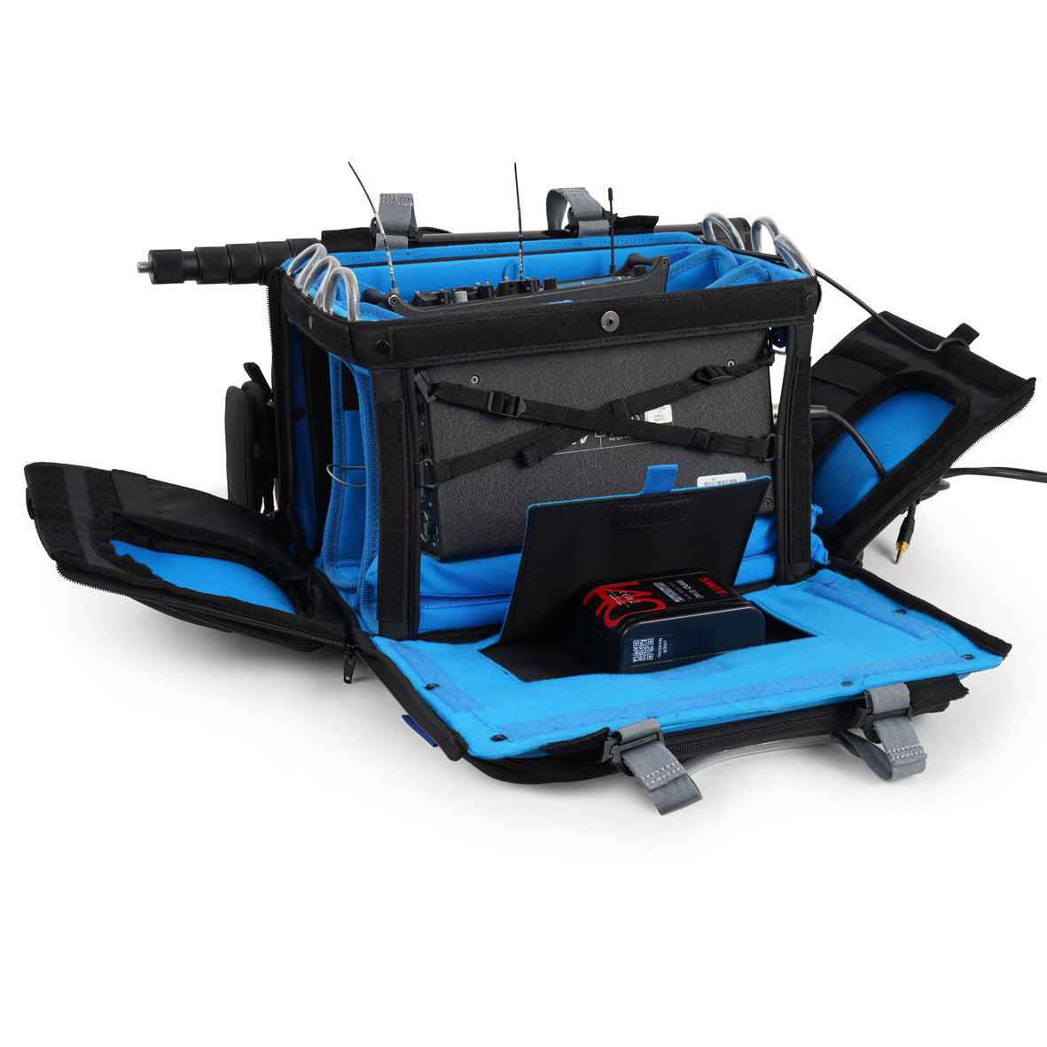 Black and blue audio mixer bag with open internal compartments and organizer panels