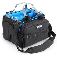 Black and blue audio mixer bag with ORCA logo patch, side pockets, and shoulder strap