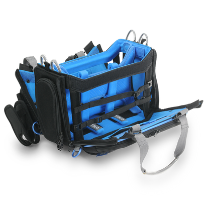 Audio mixer bag with open top and side pockets; black exterior with blue lining and handles