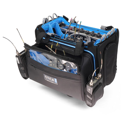 Black audio mixer bag with clear front cover, ORCA label, and cable connector slots
