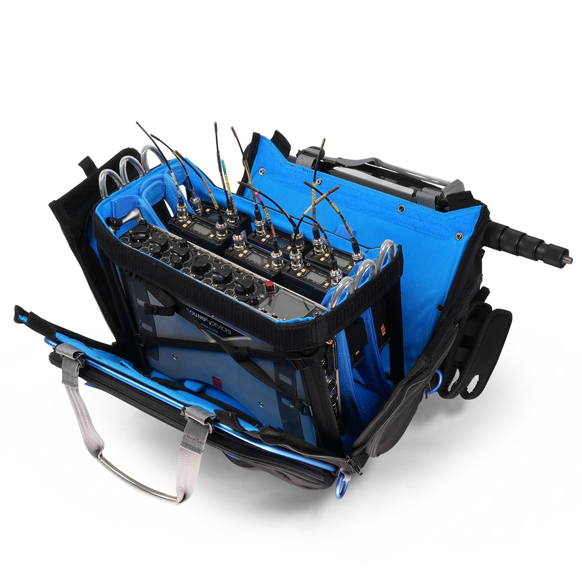 Blue and black audio mixer bag open to show multiple compartments and connectors