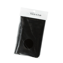 Black faux fur patch with adhesive backing and round cutout for mounting
