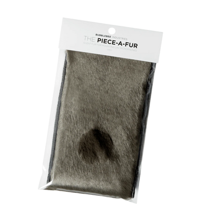 Grey faux fur patch with adhesive backing and round cutout for mounting