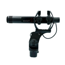 Black shock mount holding a cylindrical microphone with suspension frame
