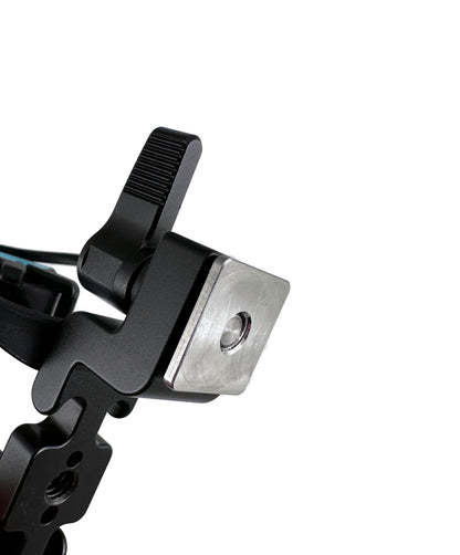 RAD-2 camera shoe microphone shock mount with silver mounting plate and ridged thumb lever