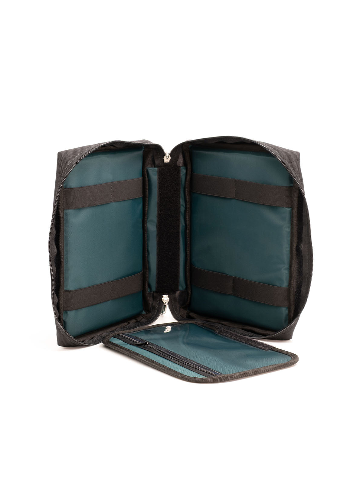 Radio holder case open flat, teal interior pockets and hinged side panel