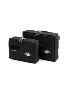Pair of black radio holder cases with zippers and embroidered SAMAS logos