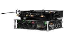 Audio device side view with multi-knob panel, color display, and gold-cabled connectors