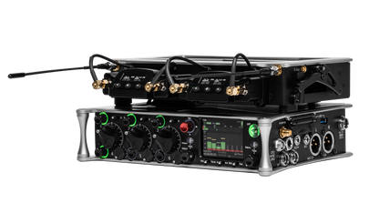 Audio device side view with multi-knob panel, color display, and gold-cabled connectors