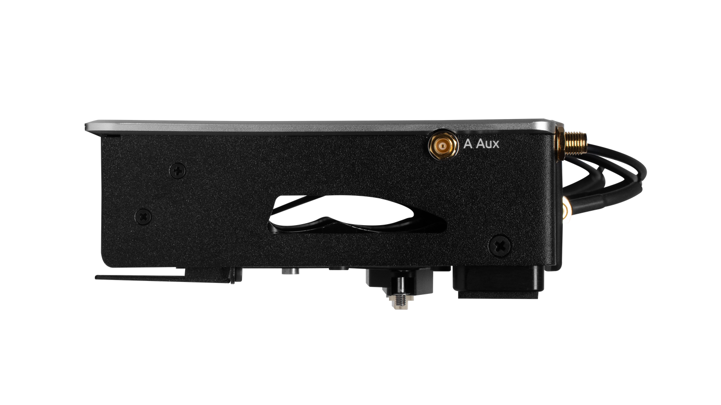Audio device side panel with A Aux label, cable ports, and black textured housing