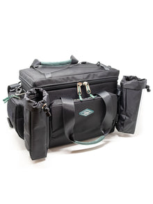 Accessory case in dark gray with teal-lined compartments and multiple side zip pouches