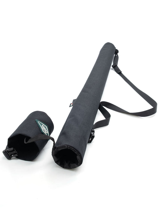 Dark fabric boom holder with two end caps and shoulder carry straps