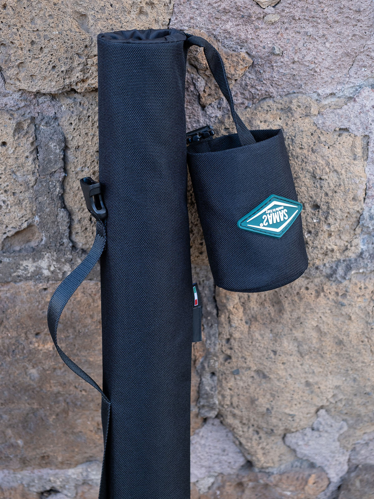 Dark fabric boom holder with shoulder strap and side storage pouch