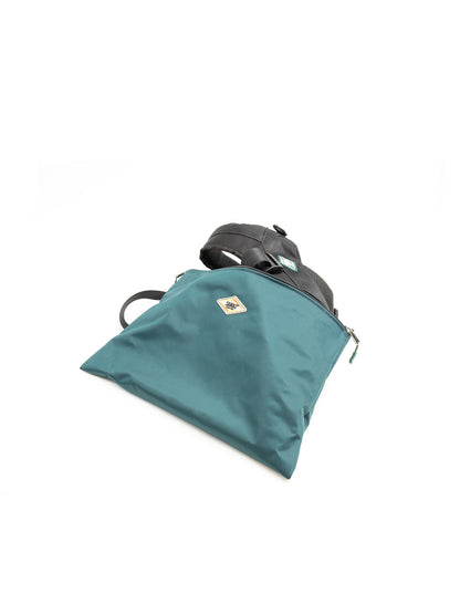 Teal and black tactical harness with organizer pouches and adjustable straps