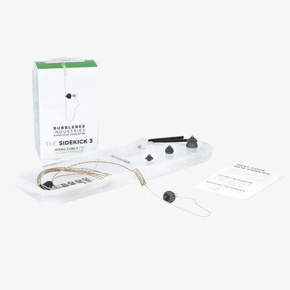 In-ear monitor kit with earbuds, ear tips, and cable shown with retail packaging