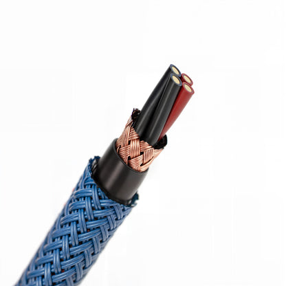 Close-up of blue braided cable with exposed copper core and black heat-shrink sleeve