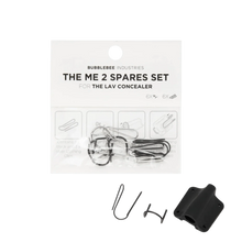 Lav concealer spares set showing metal clips and black mount holder on card