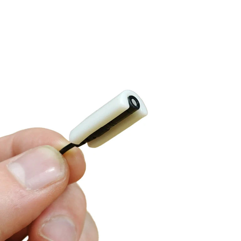 Beige MiniMount lav mic mount sleeve end with connector opening