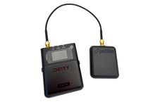 Black cable with display module and Pebble receiver box; gold connectors