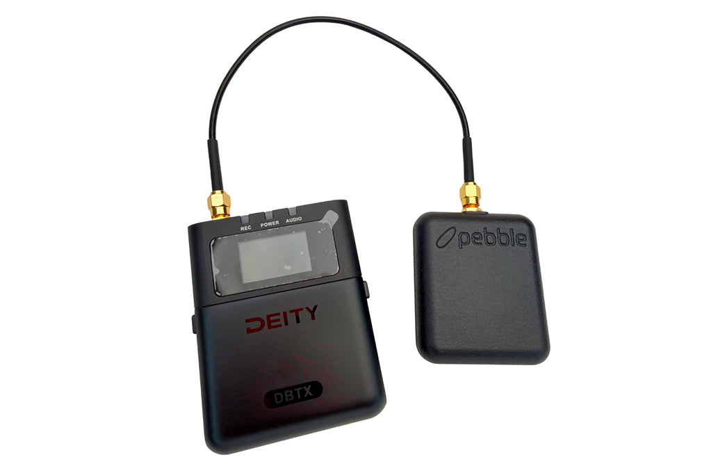 Black cable with display module and Pebble receiver box; gold connectors