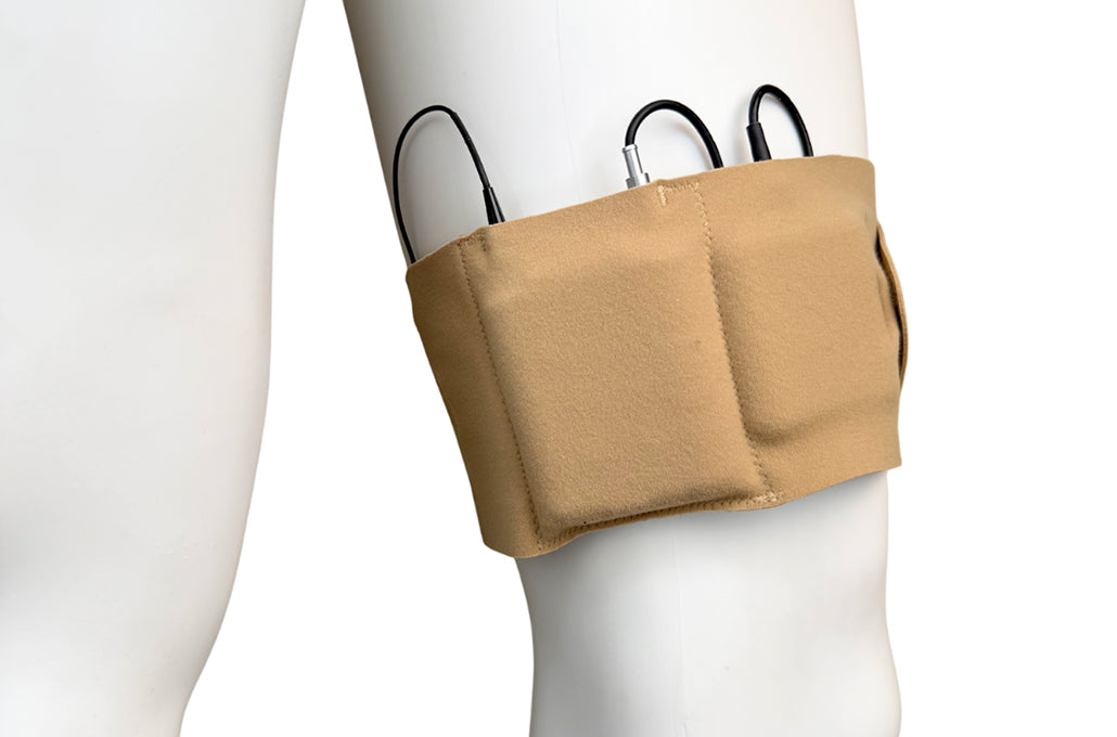 Beige receiver pouch on mannequin with multiple cable connectors