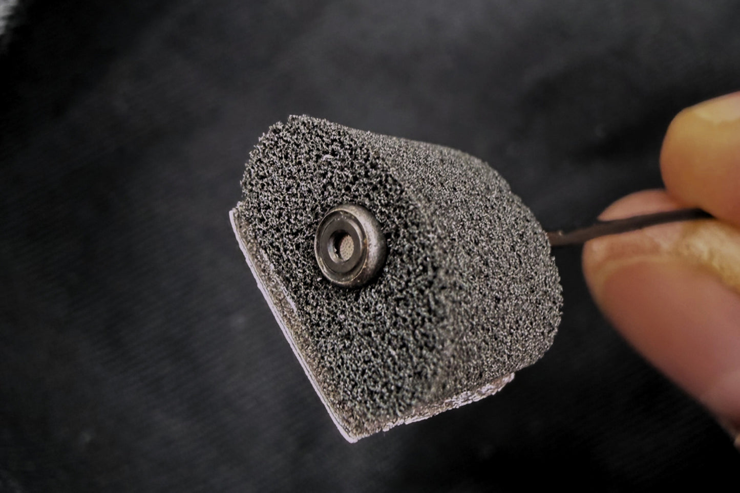 Foam for Lav PRO microphone windscreen with metal snap grommet detail