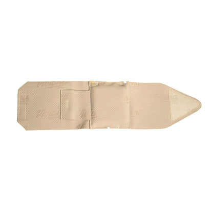Beige ankle strap pouch, flat view, with molded pocket detail and triangular end
