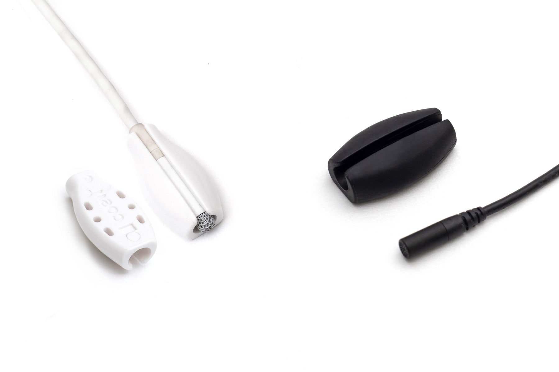 Cable connector tips: white plug with slots and black end with attached cable